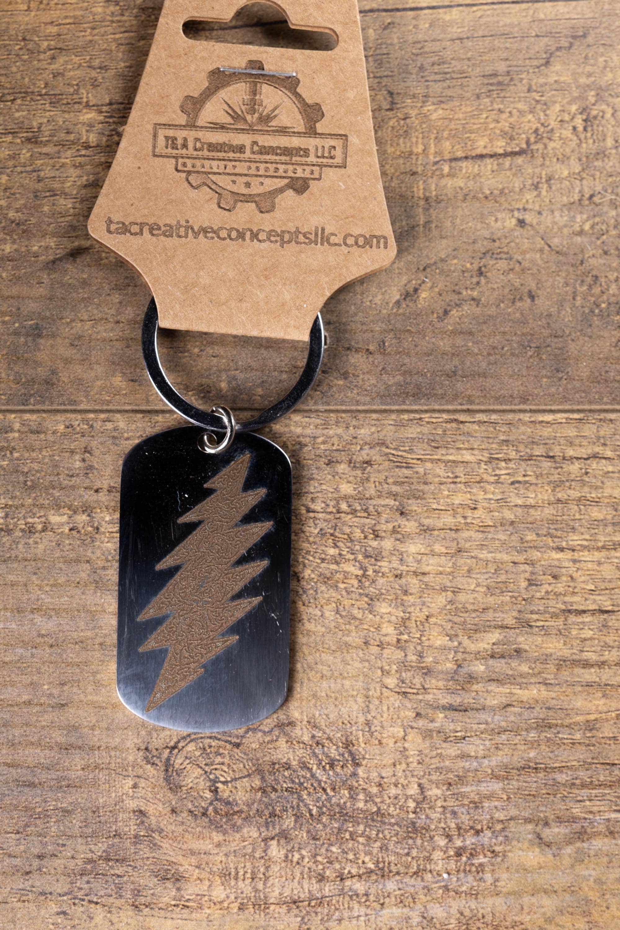 Polished stainless grateful dead celtic bolt | laser engraved band design | durable metal gift for fans