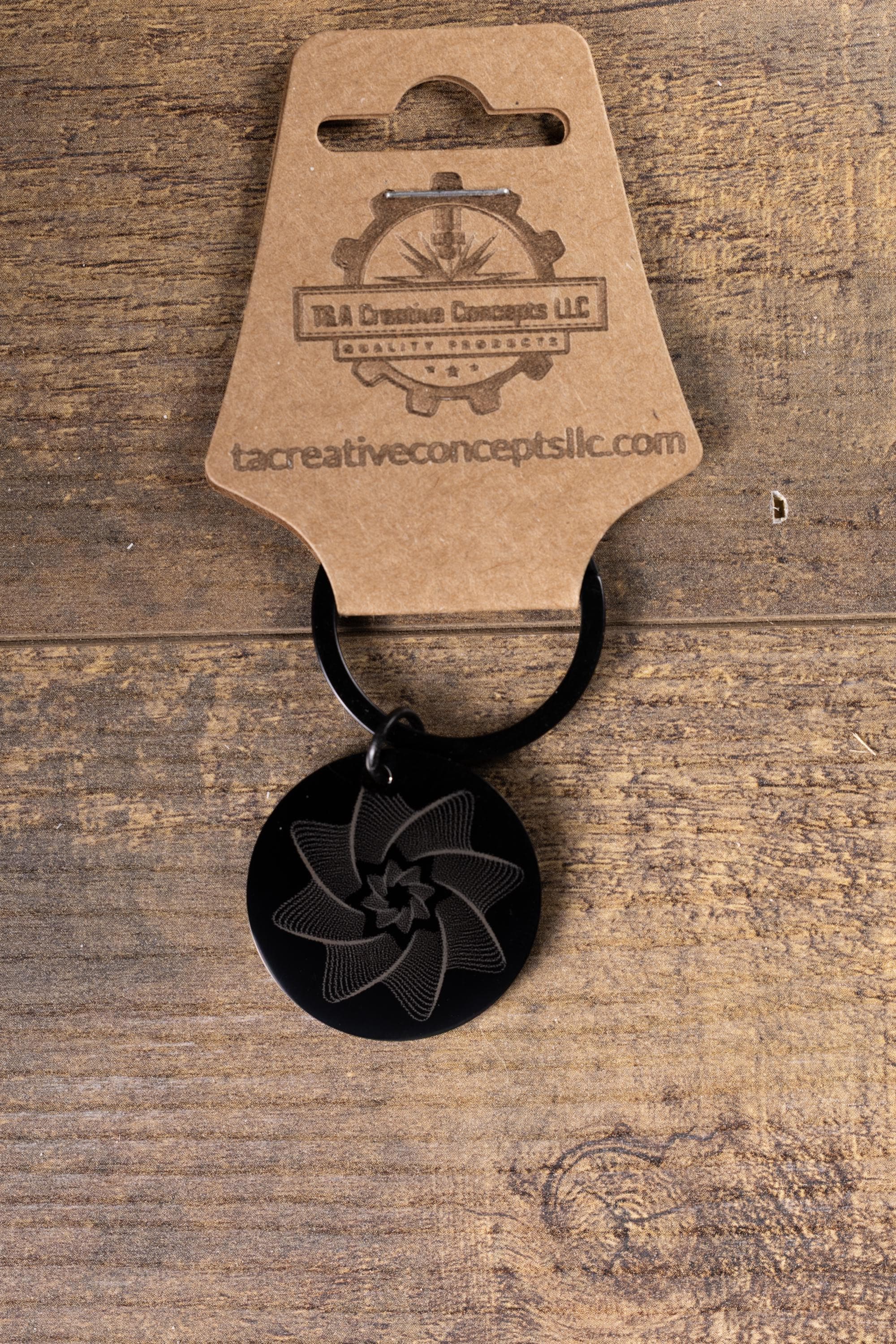 Black stainless steel spiral star keychain | laser engraved linework design both sides | modern celestial gift | durable key ring