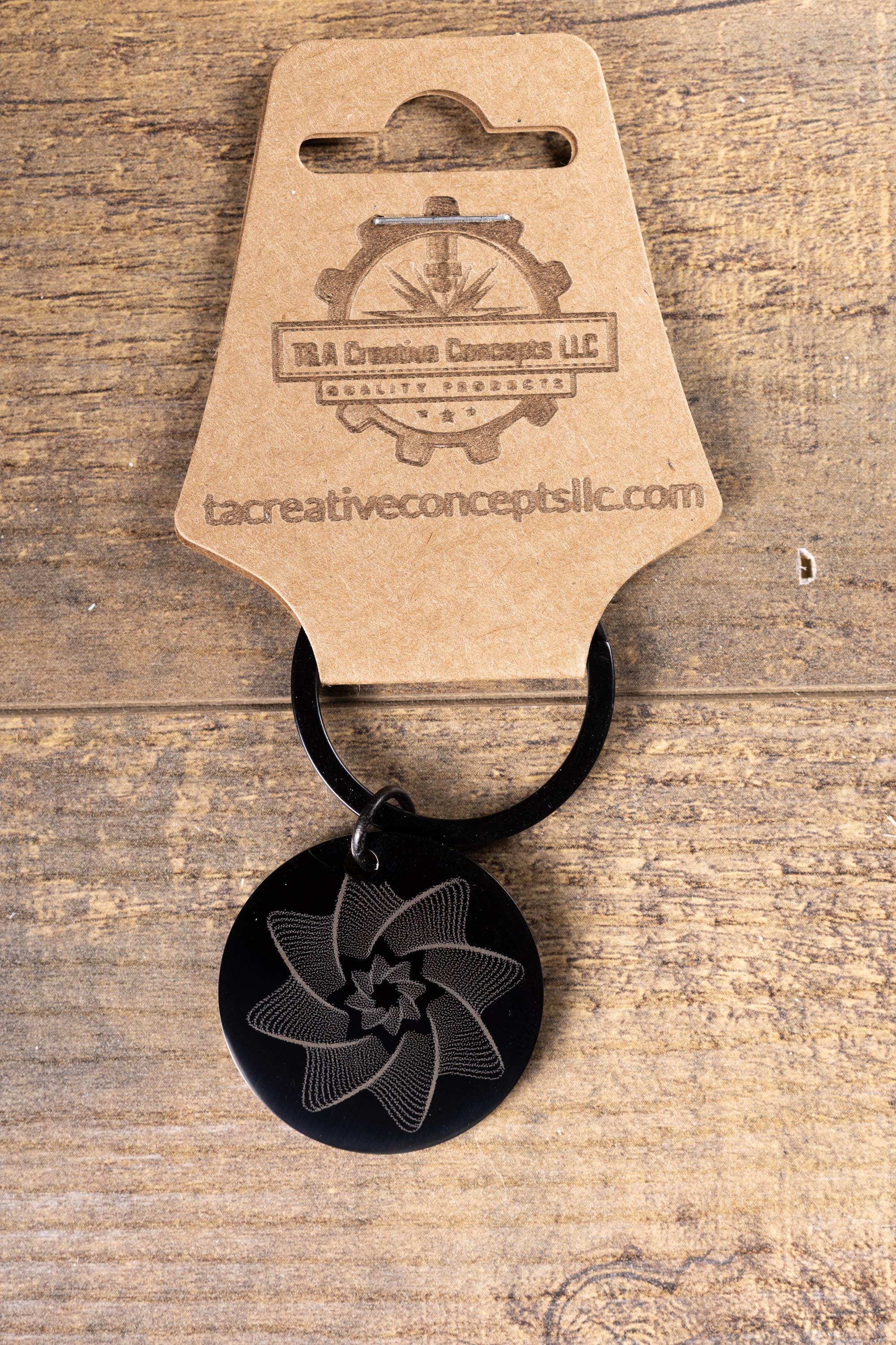 Black stainless steel spiral star keychain | laser engraved linework design both sides | modern celestial gift | durable key ring