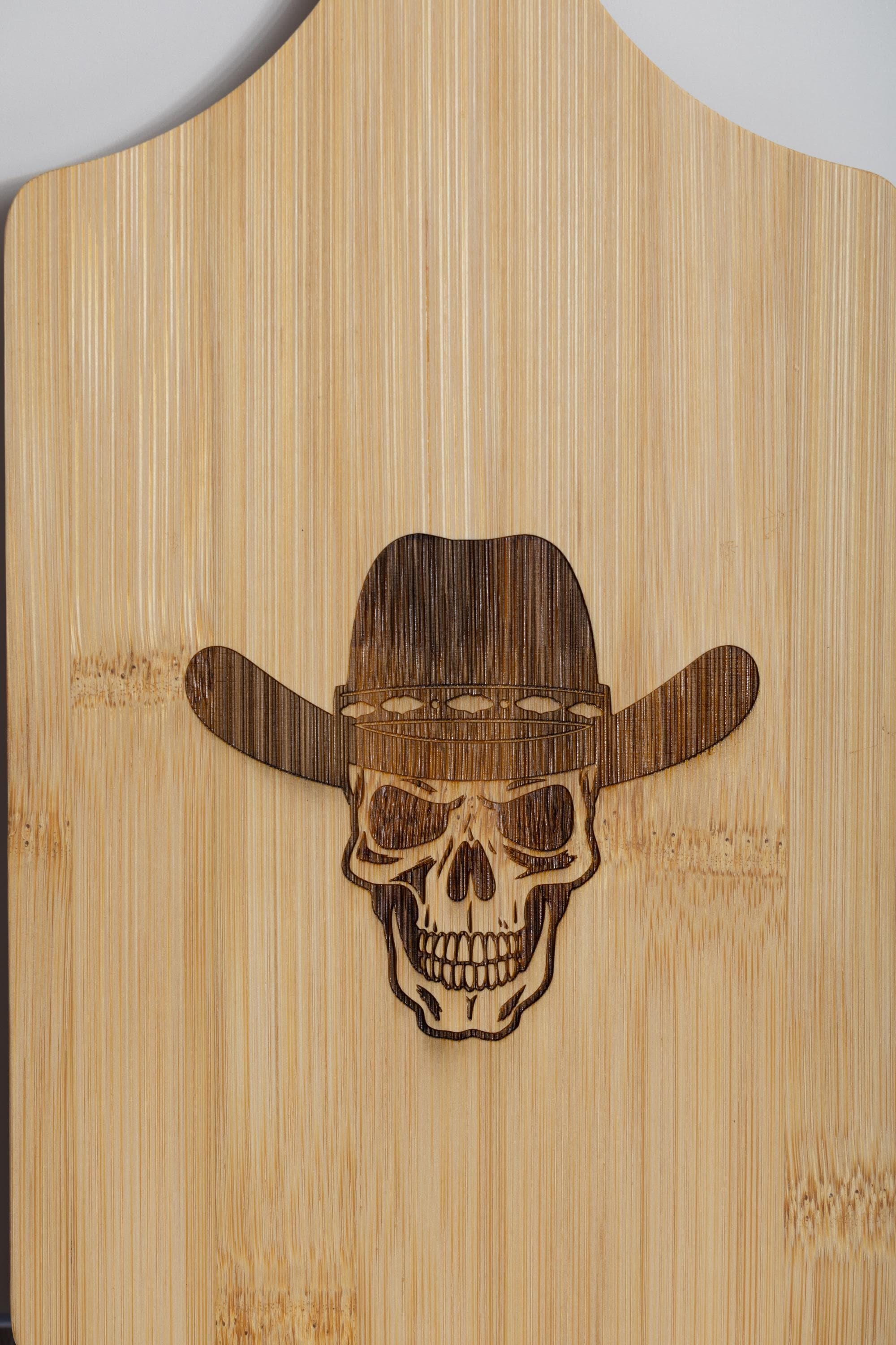 Skull in cowboy hat laser engraved bamboo cutting board 5x11 | western kitchen decor | funny gift for cowboy or chef