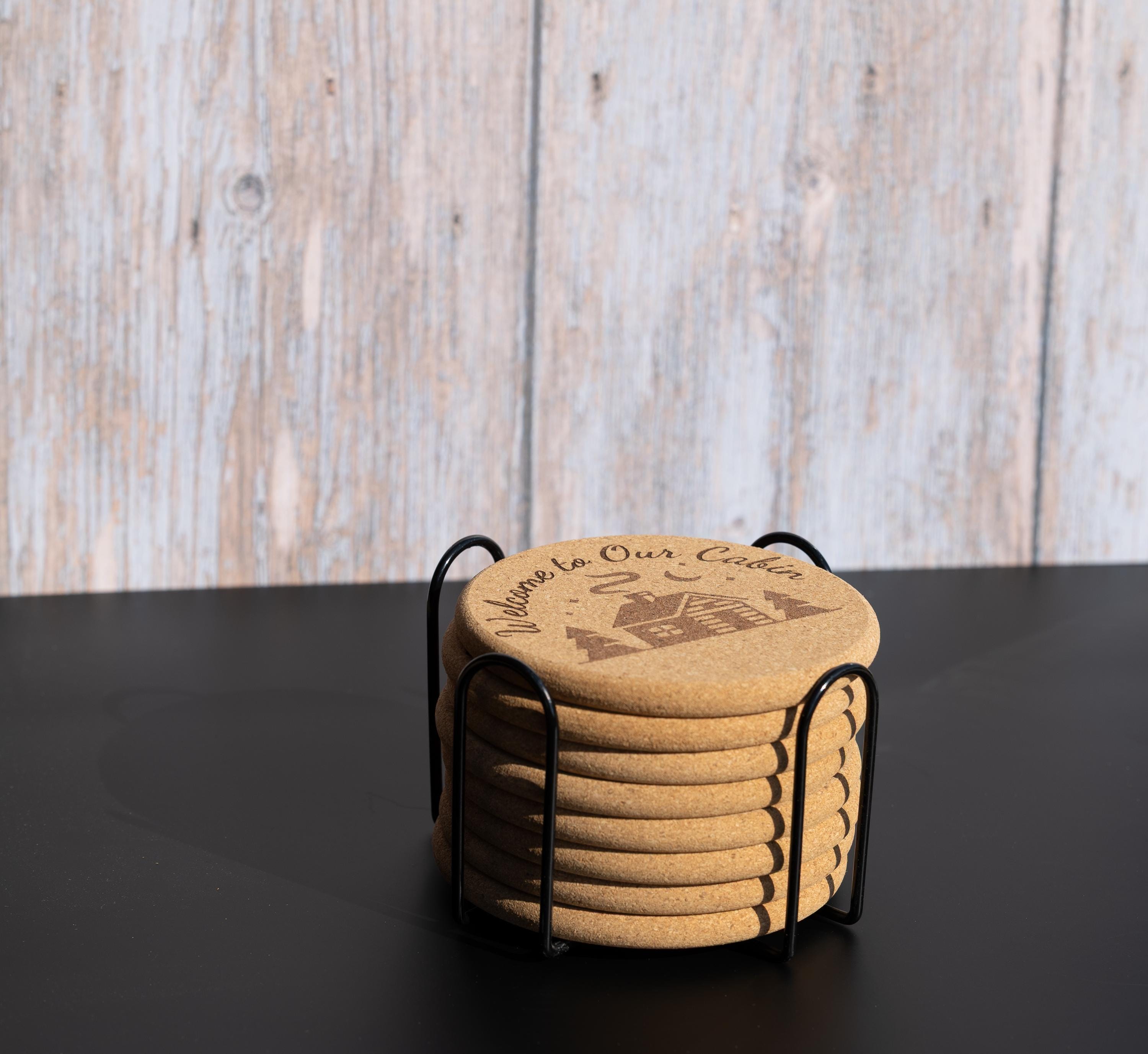 Laser engraved cabin cork coaster set: rustic welcome design