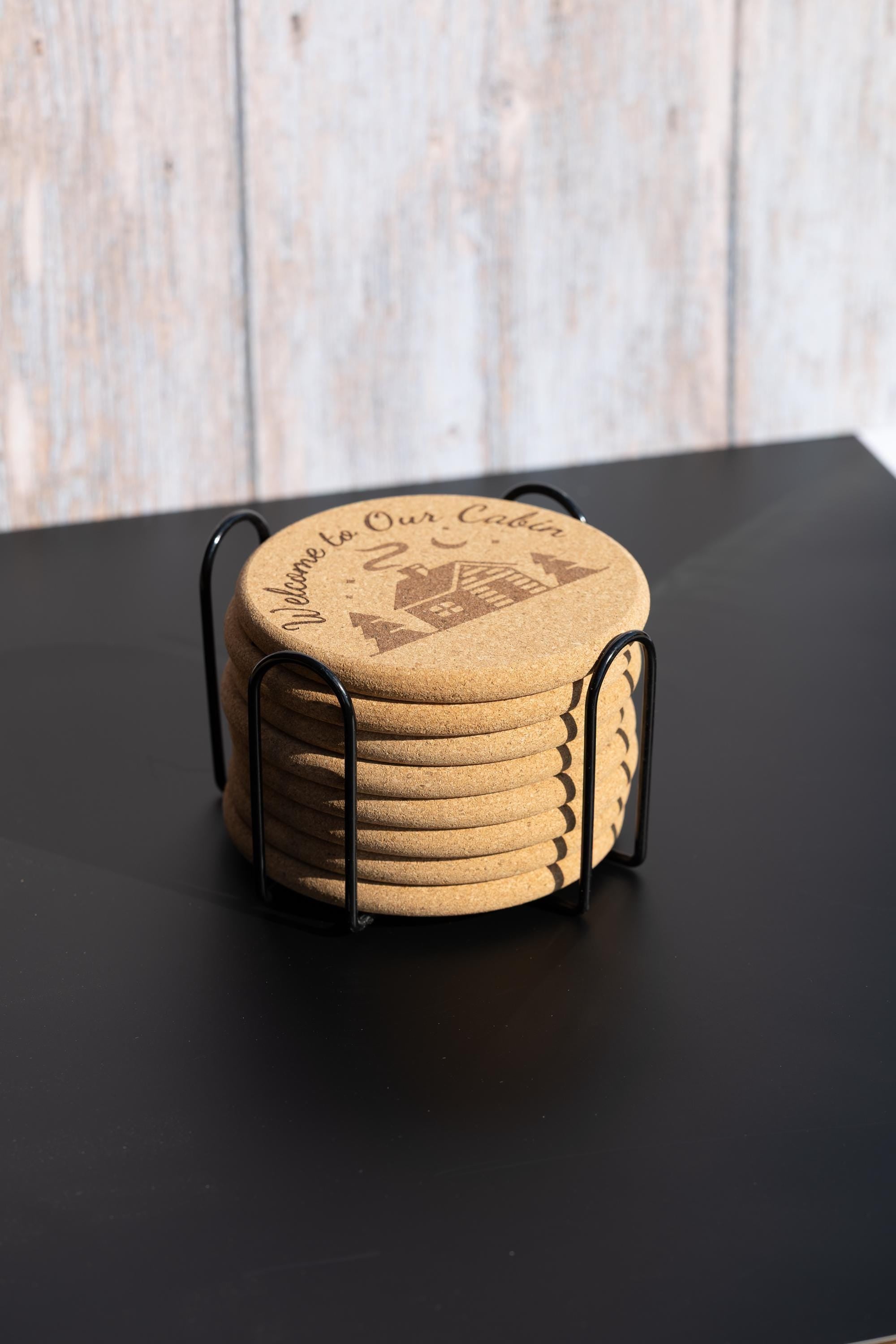 Laser engraved cabin cork coaster set: rustic welcome design