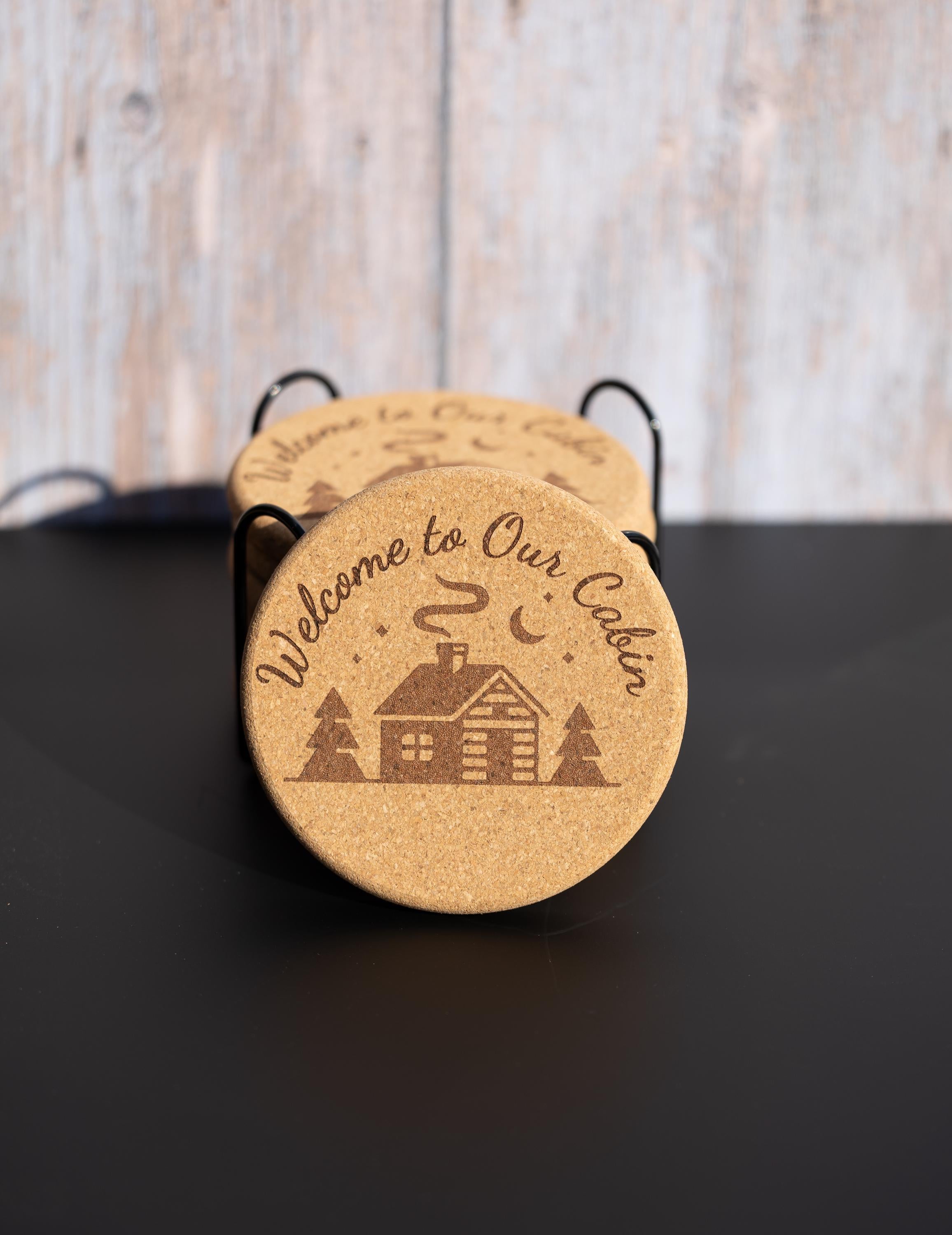 Laser engraved cabin cork coaster set: rustic welcome design
