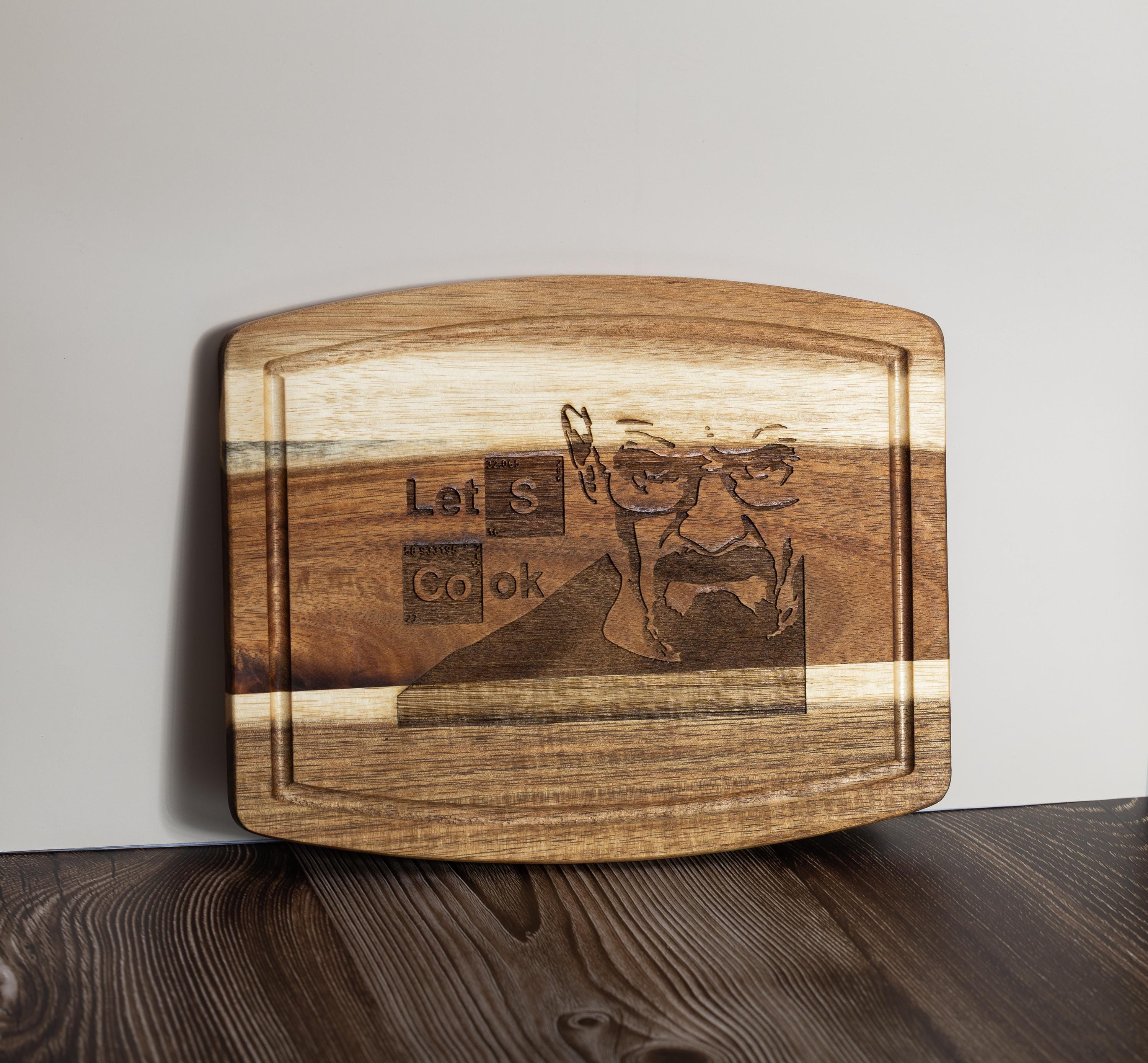Breaking bad cutting board: acacia wood, laser engraved "let's cook"