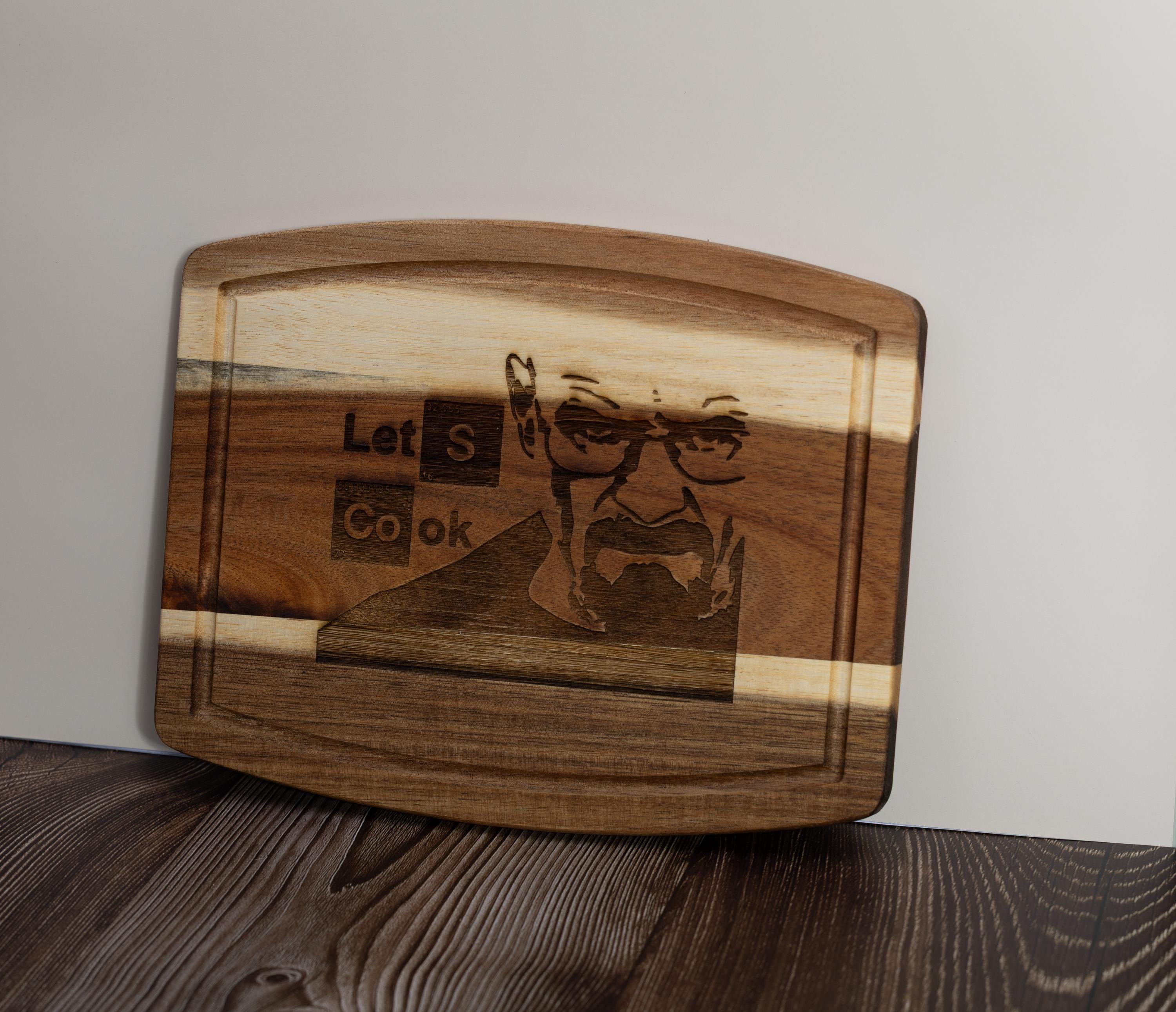 Breaking bad cutting board: acacia wood, laser engraved "let's cook"