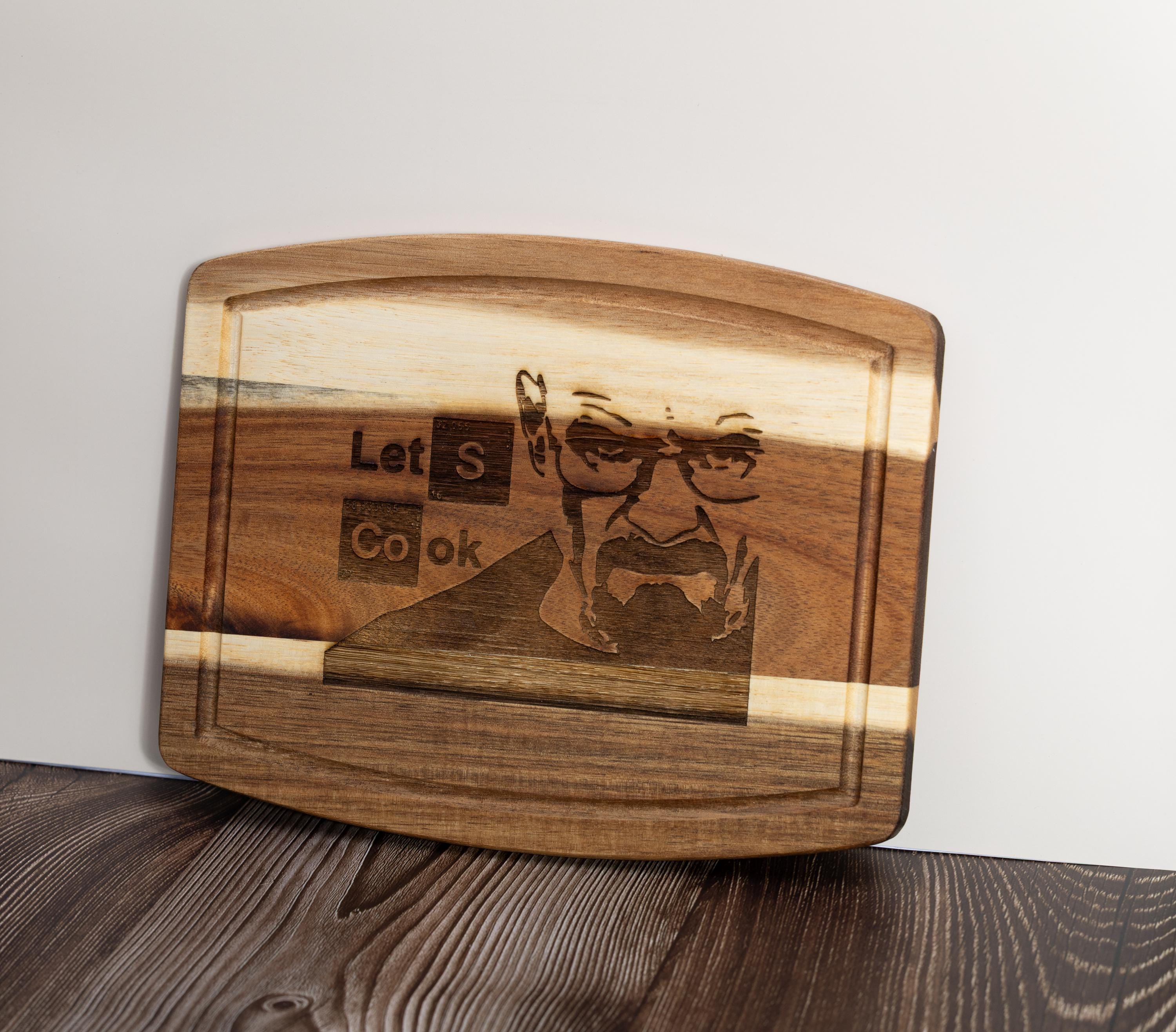 Breaking bad cutting board: acacia wood, laser engraved "let's cook"