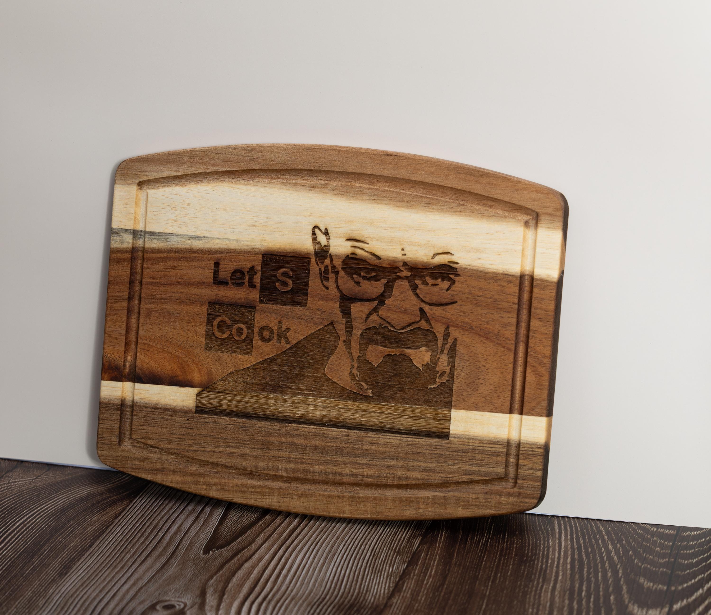 Breaking bad cutting board: acacia wood, laser engraved "let's cook"