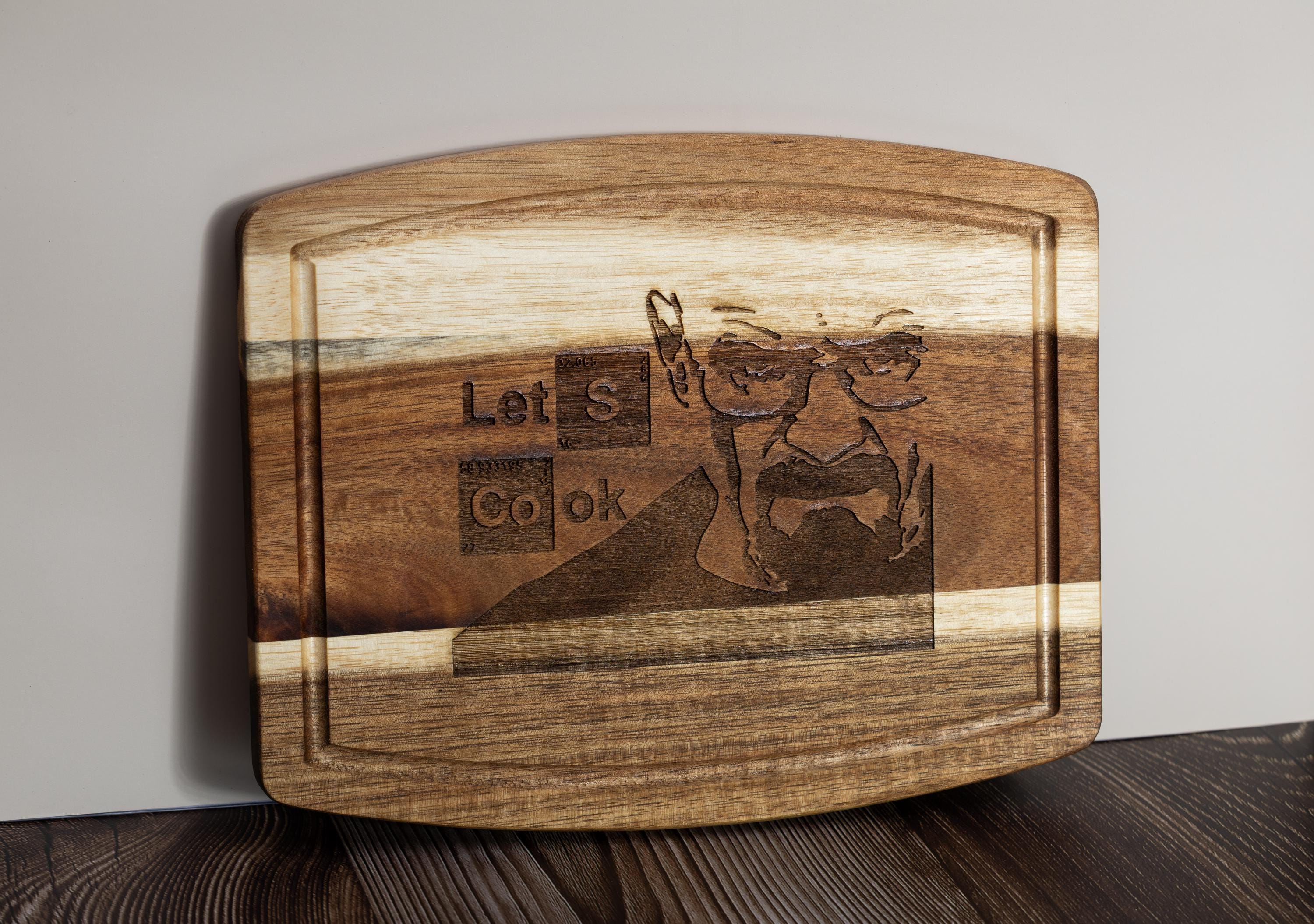 Breaking bad cutting board: acacia wood, laser engraved "let's cook"