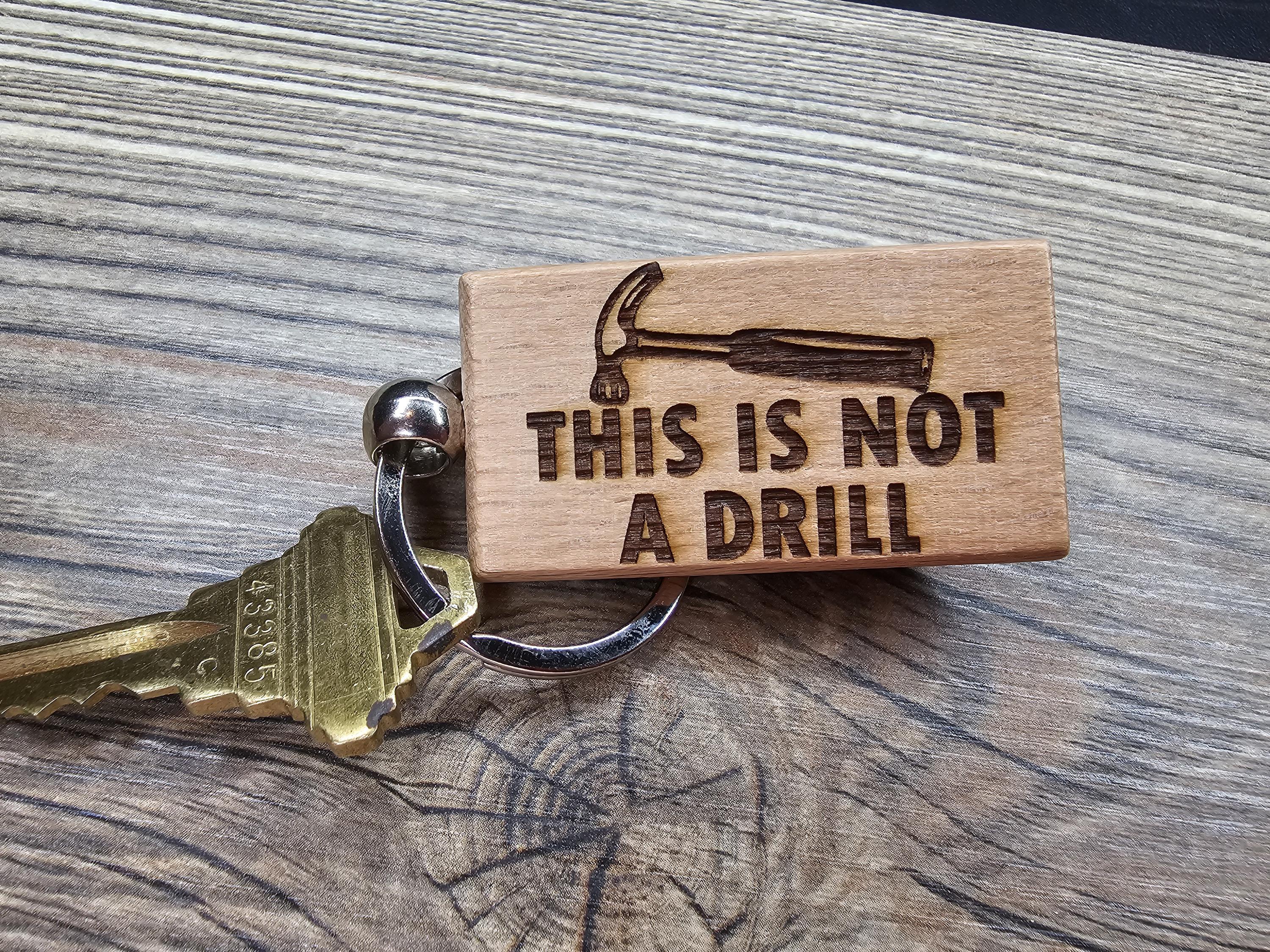 Funny hammer keychain / bag charm: "this is not a drill" engraved hardwood