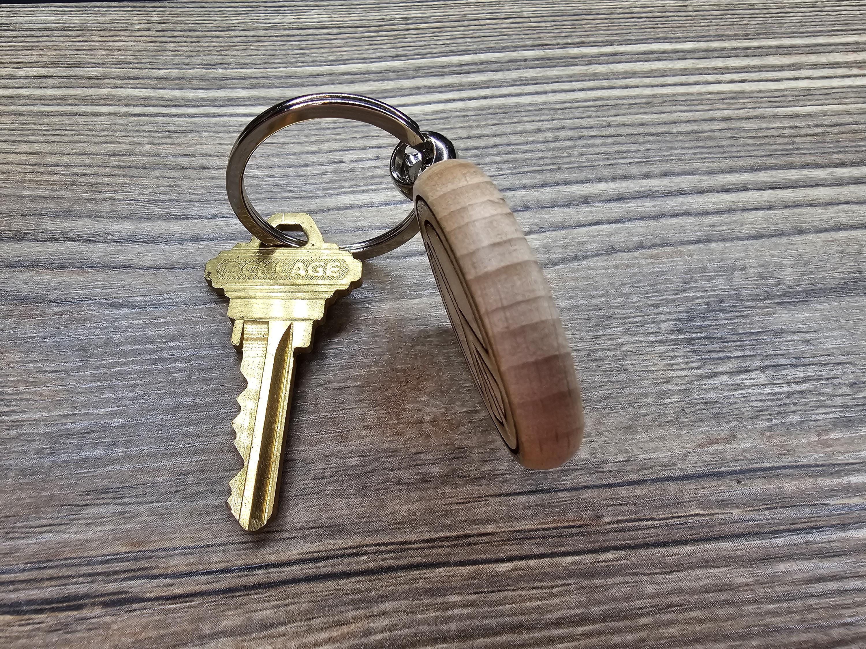 Laser engraved peace sign keychain / bag charm: hardwood with stainless steel keyring