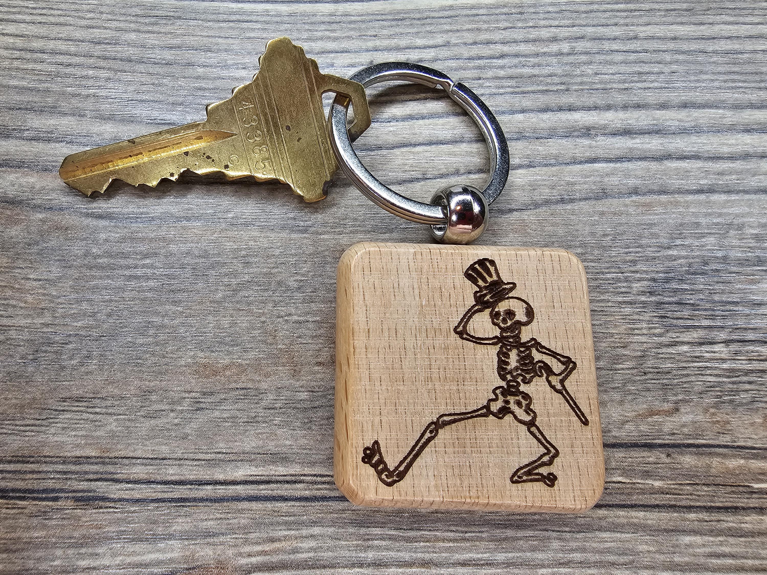 Grateful Dead dancing skeleton keychain / bag charm – double-sided laser engraved wood with stainless steel keyring, band fan gift