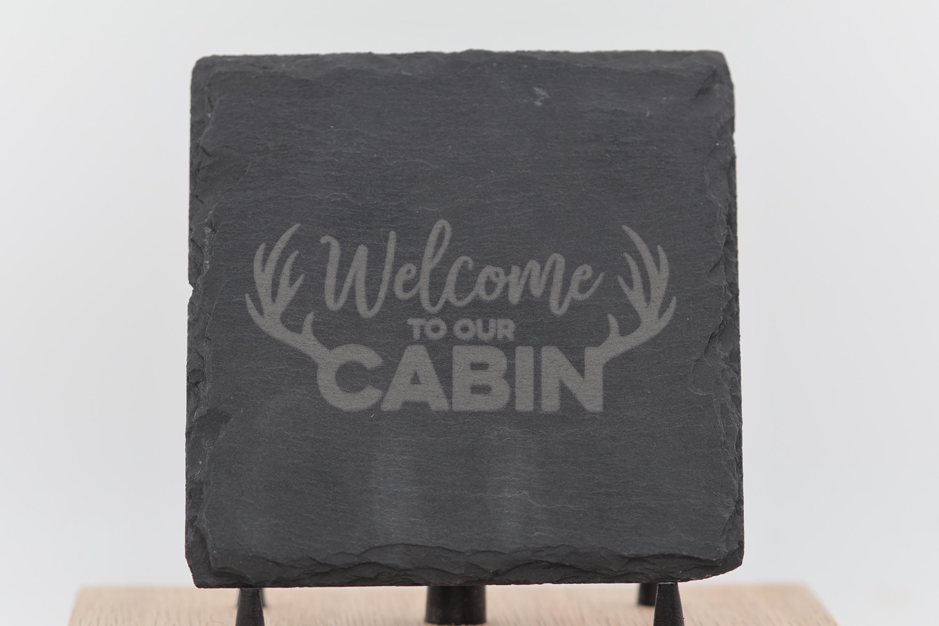 Laser engraved slate cabin coasters: rustic home bar decor