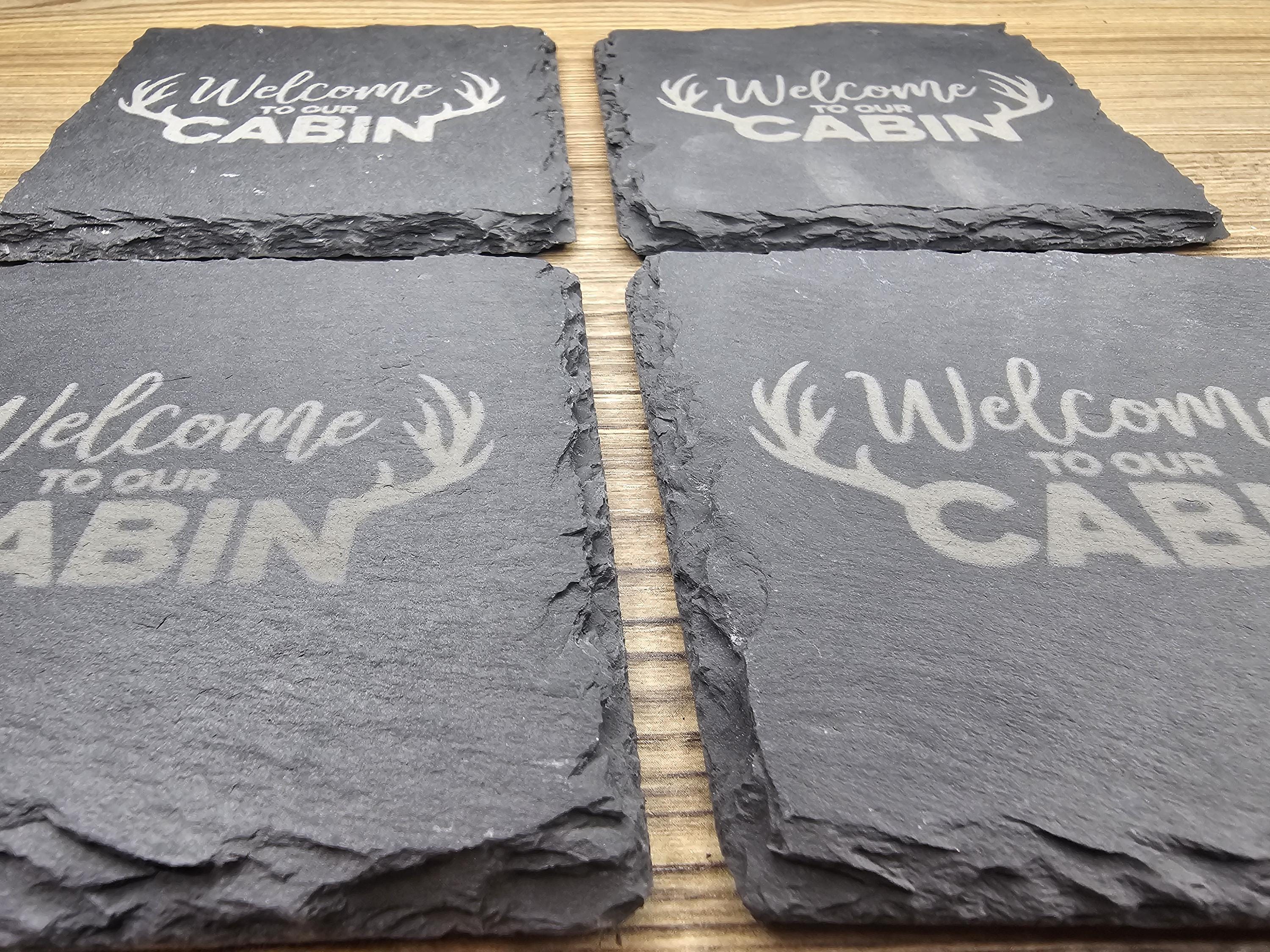 Laser engraved slate cabin coasters: rustic home bar decor
