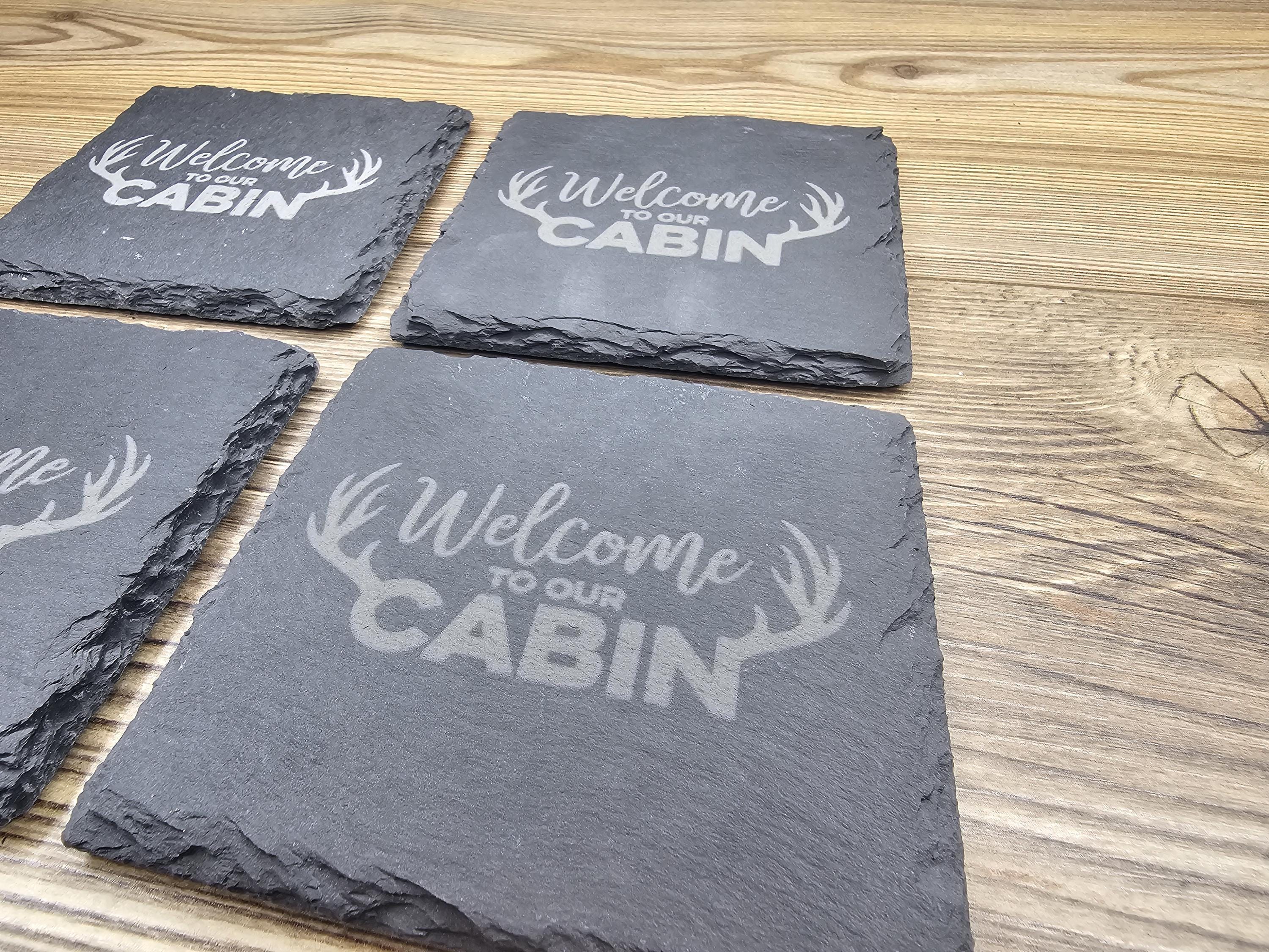 Laser engraved slate cabin coasters: rustic home bar decor