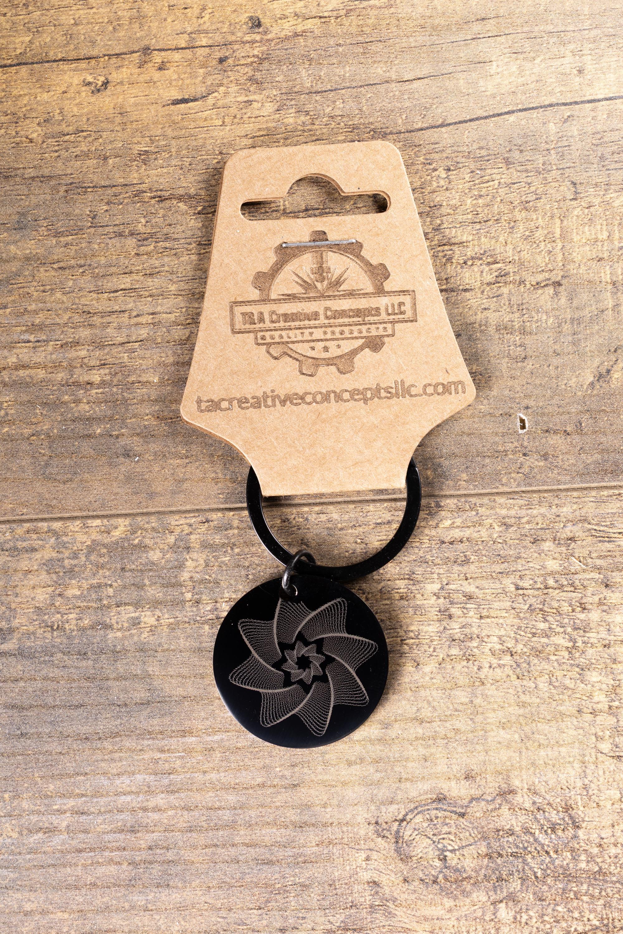 Black stainless steel spiral star keychain | laser engraved linework design both sides | modern celestial gift | durable key ring