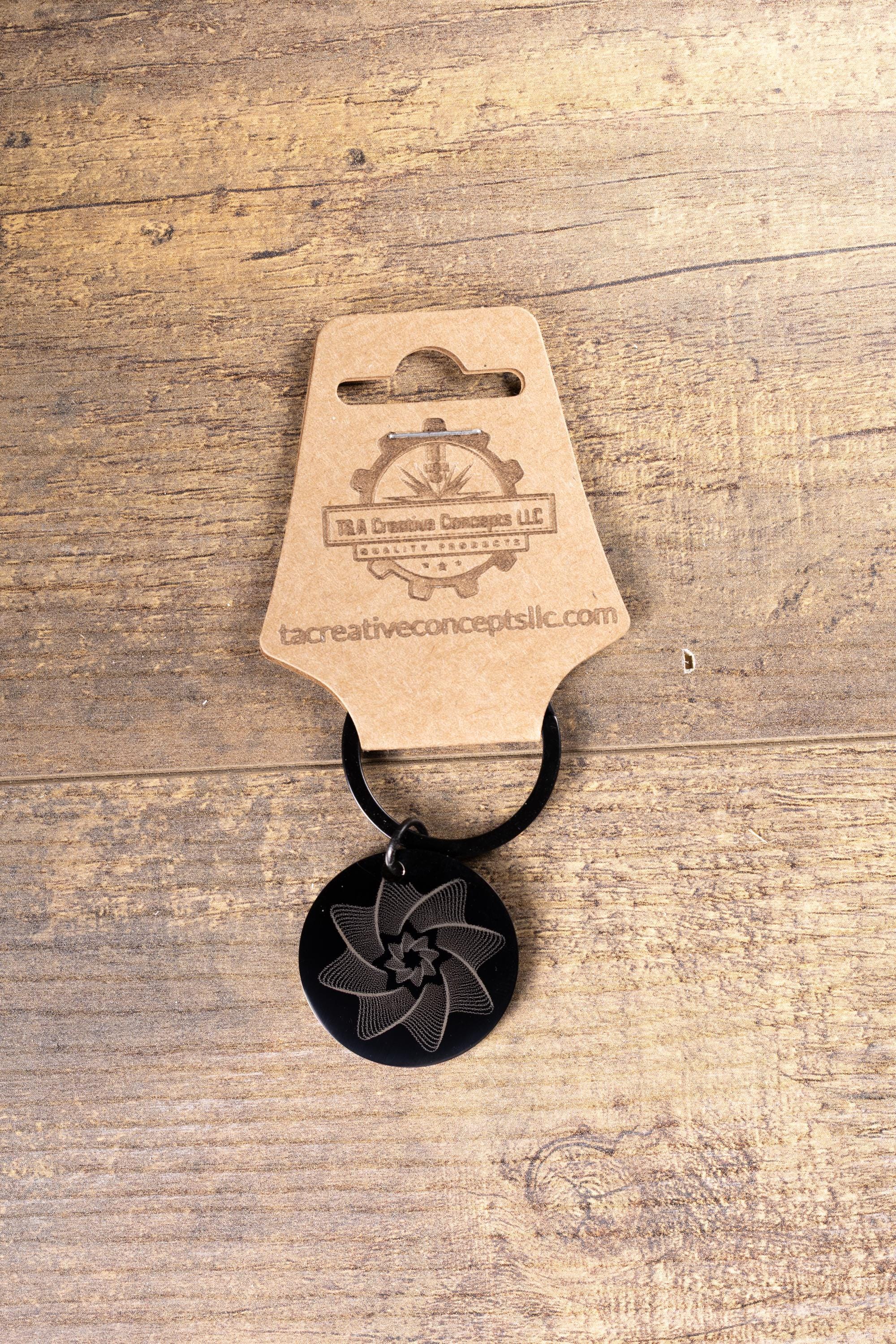 Black stainless steel spiral star keychain | laser engraved linework design both sides | modern celestial gift | durable key ring