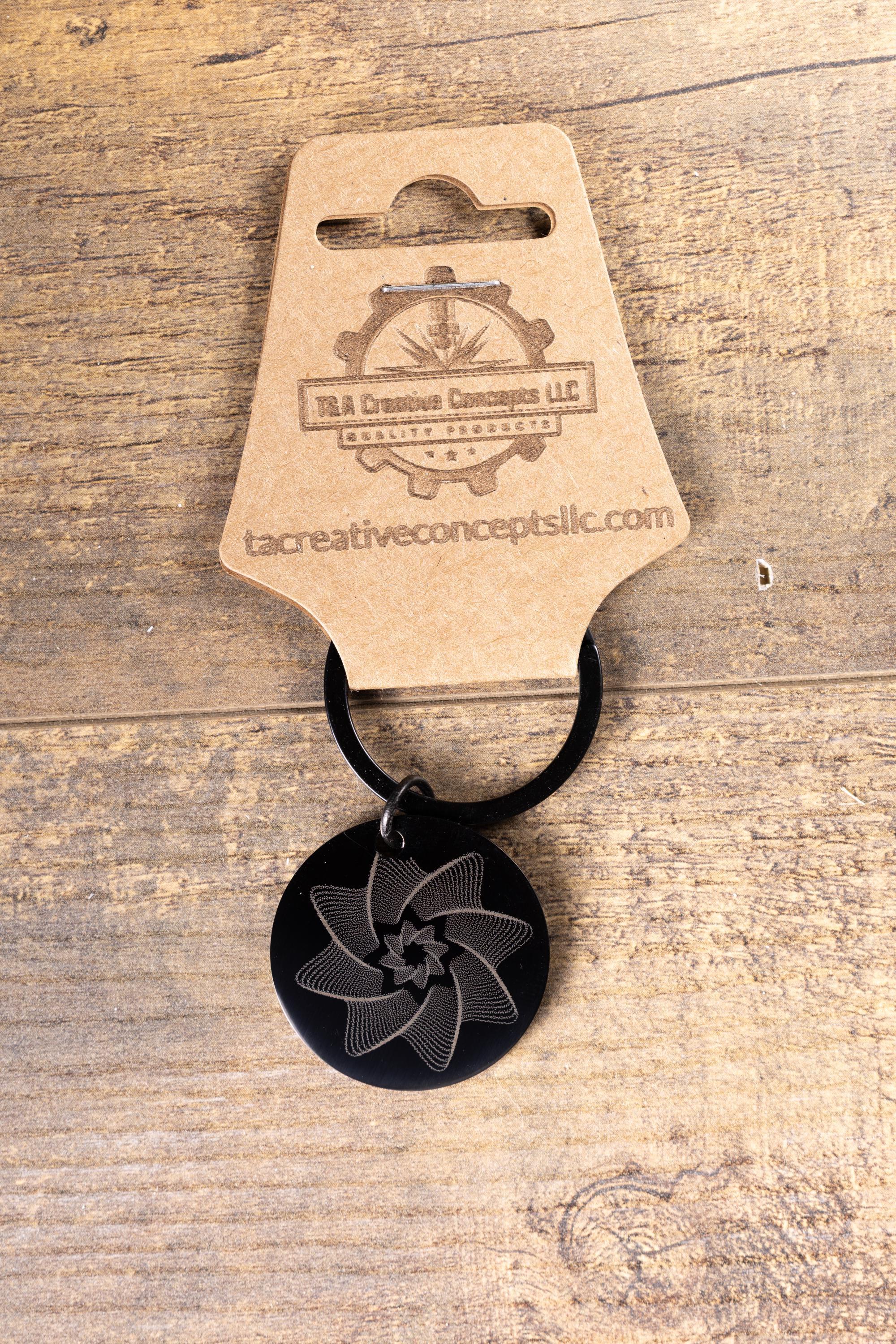 Black stainless steel spiral star keychain | laser engraved linework design both sides | modern celestial gift | durable key ring