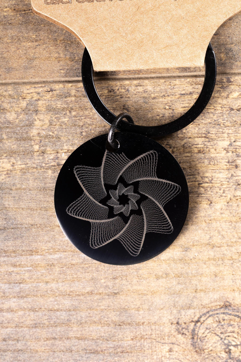 Black stainless steel spiral star keychain | laser engraved linework design both sides | modern celestial gift | durable key ring