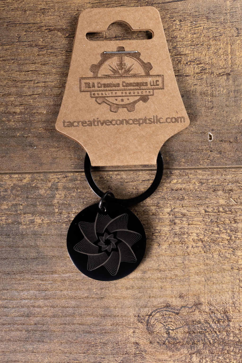 Black stainless steel spiral star keychain | laser engraved linework design both sides | modern celestial gift | durable key ring