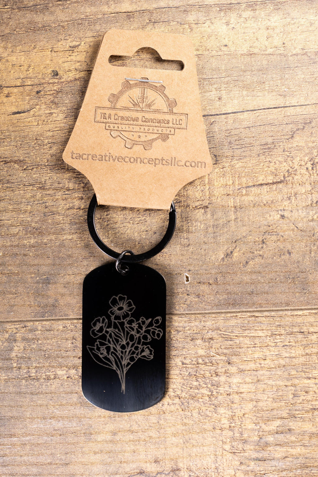 Laser engraved floral keychain: black stainless steel flower gift