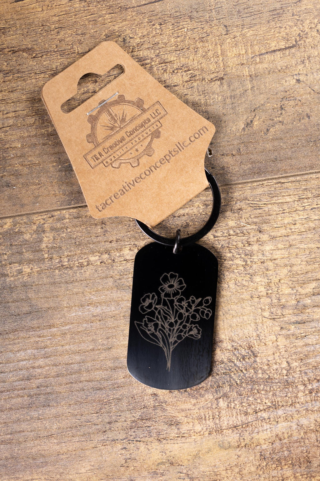 Laser engraved floral keychain: black stainless steel flower gift