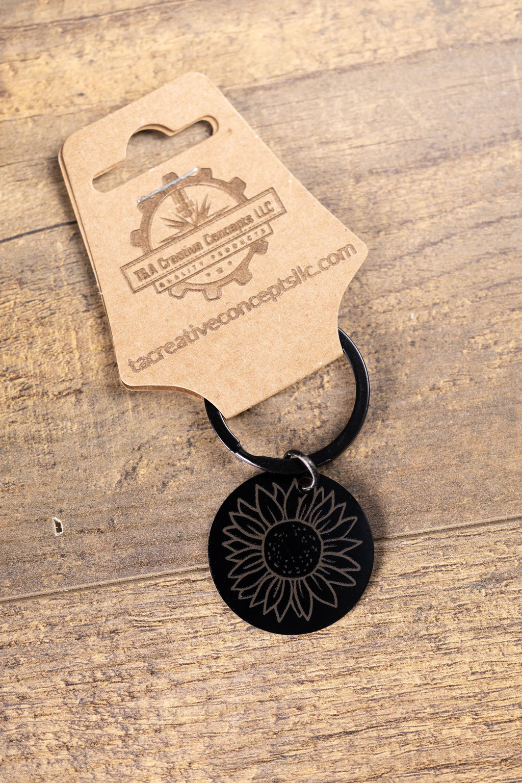 Laser engraved sunflower keychain: black stainless steel, stylish gift