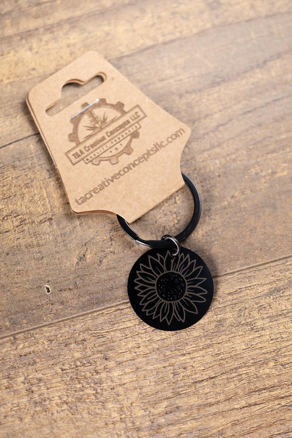 Laser engraved sunflower keychain: black stainless steel, stylish gift
