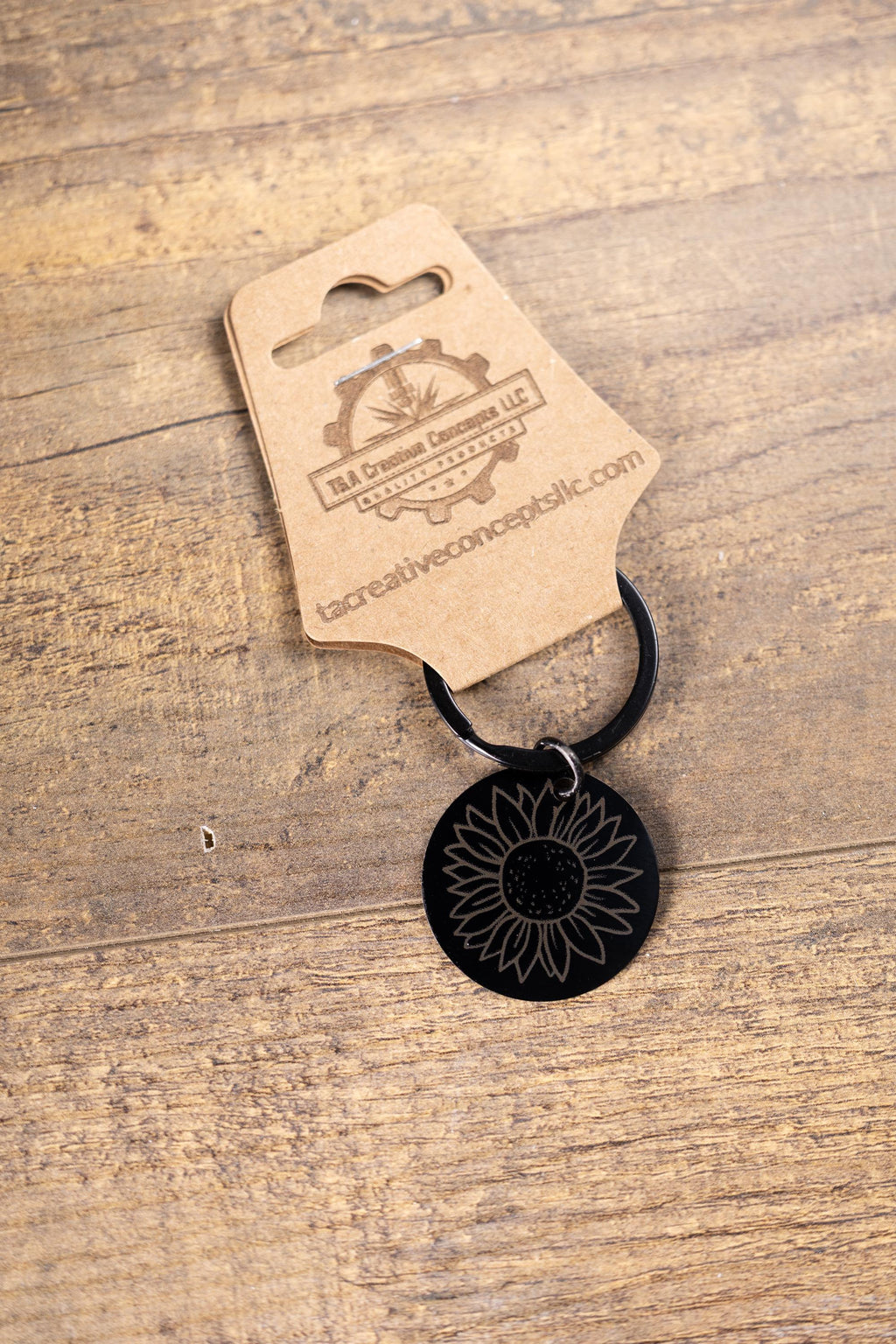 Laser engraved sunflower keychain: black stainless steel, stylish gift