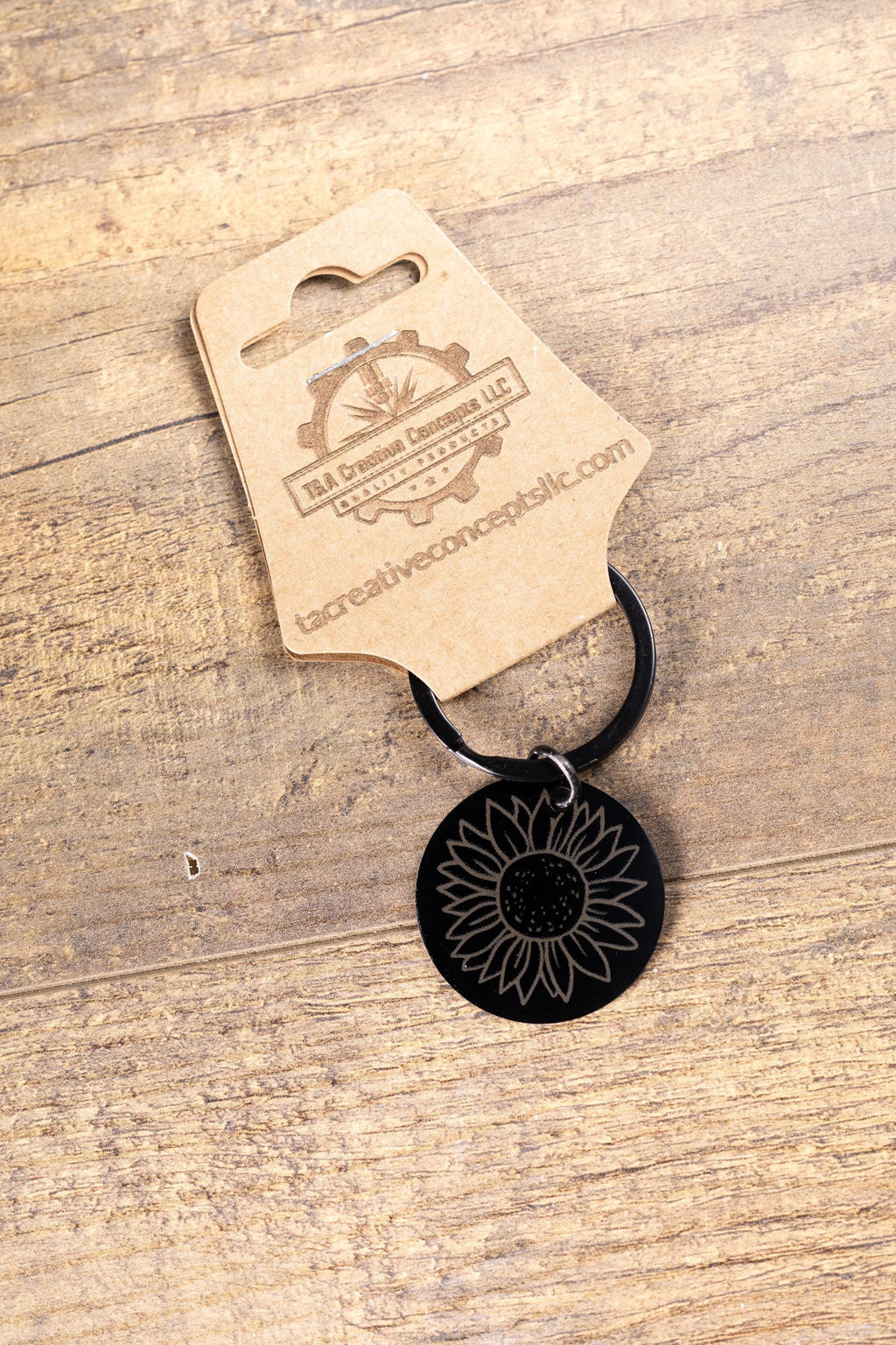 Laser engraved sunflower keychain: black stainless steel, stylish gift