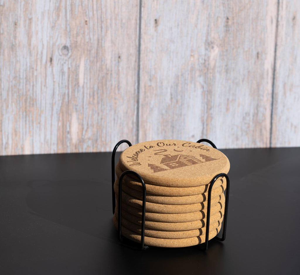 Laser engraved cabin cork coaster set: rustic welcome design