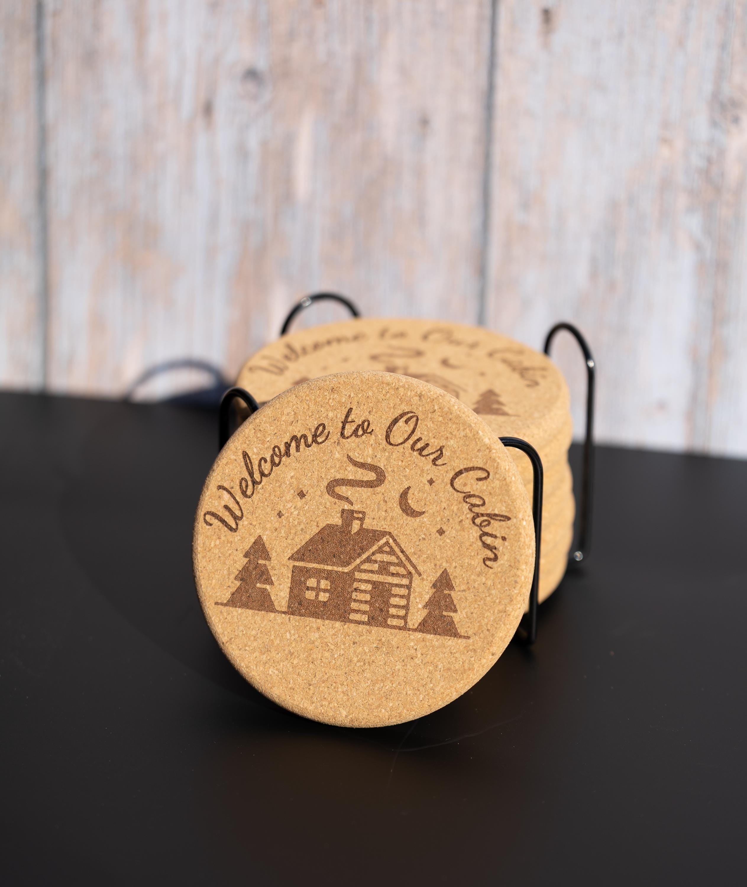 Laser engraved cabin cork coaster set: rustic welcome design