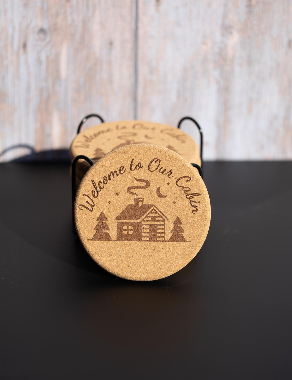 Laser engraved cabin cork coaster set: rustic welcome design
