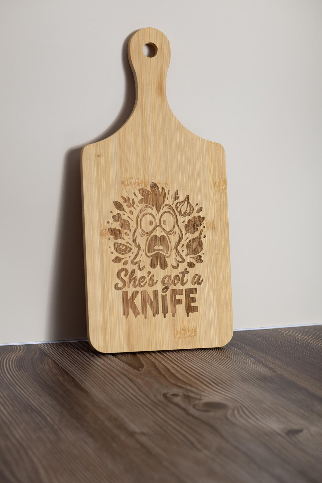 Funny laser engraved bamboo cutting board - "she's got a knife" kitchen decor (5"x11")