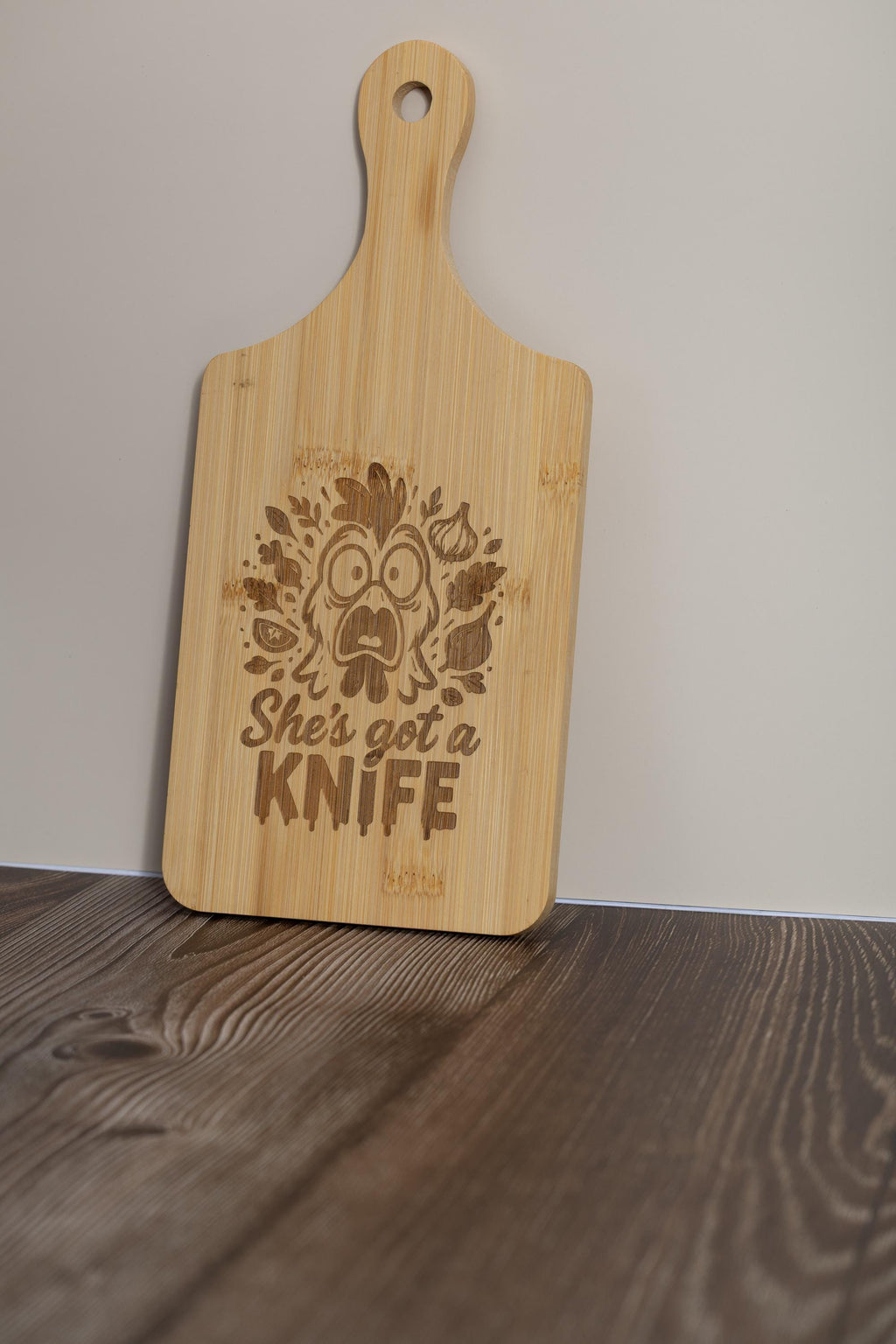 Funny laser engraved bamboo cutting board - "she's got a knife" kitchen decor (5"x11")
