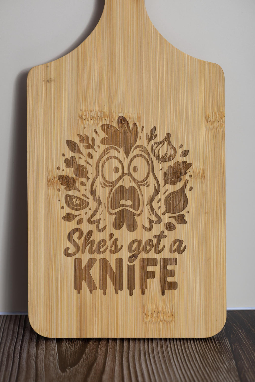 Funny laser engraved bamboo cutting board - "she's got a knife" kitchen decor (5"x11")