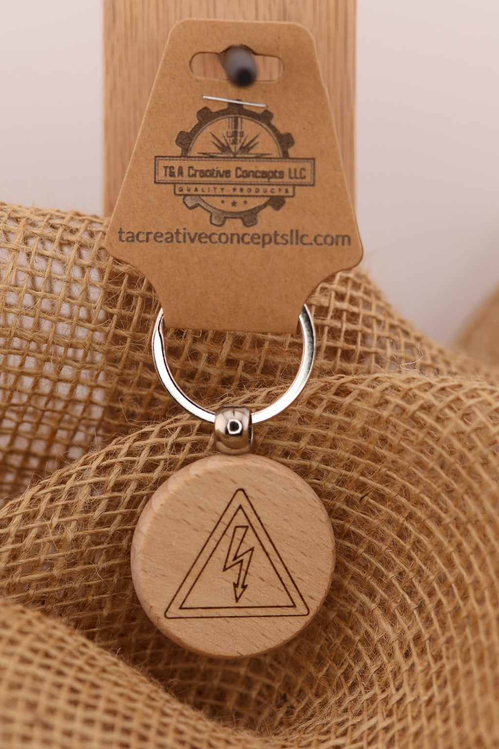 Electrical shock hazard keychain / bag charm: laser engraved wood, stainless steel keyring