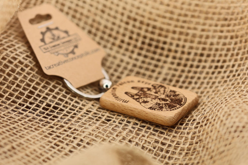 Millennium falcon keychain: laser engraved wood, stainless steel keyring