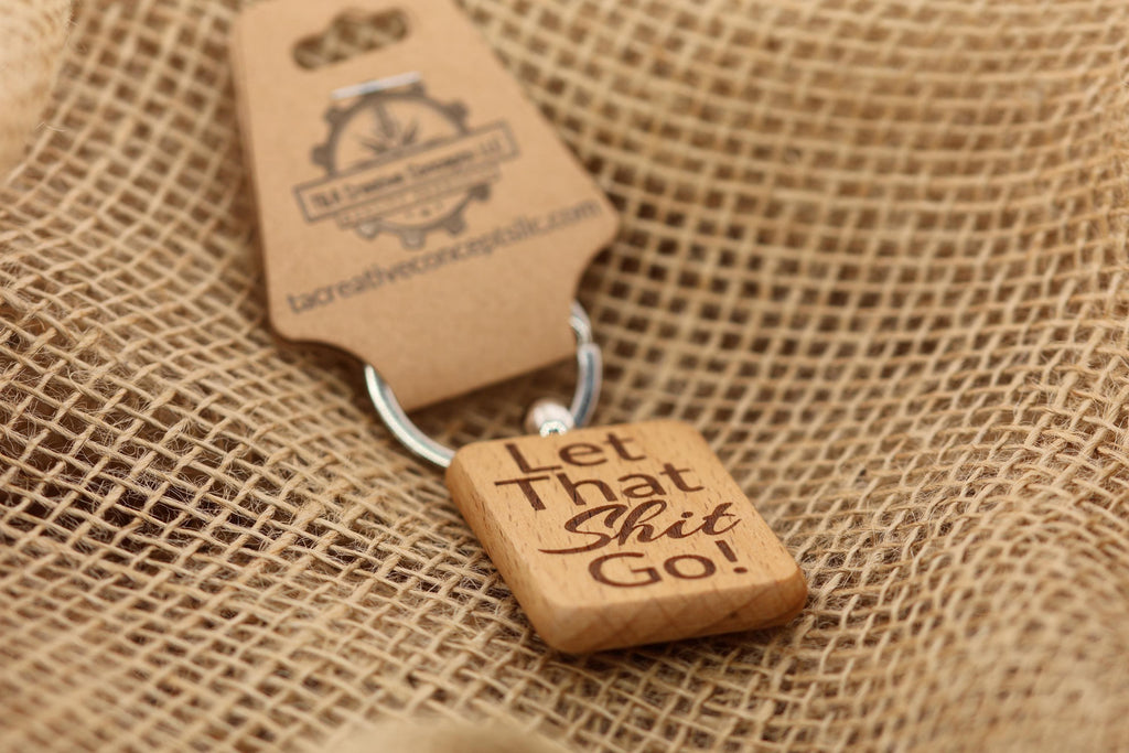 Let that shit go keychain / bag charm – double-sided laser engraved wood with stainless steel keyring, funny inspirational gift