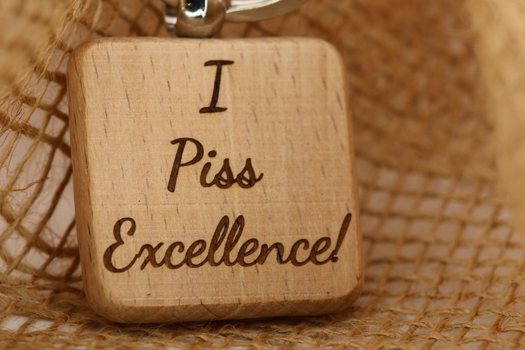 I piss excellence keychain: laser engraved hardwood, funny keychain gift