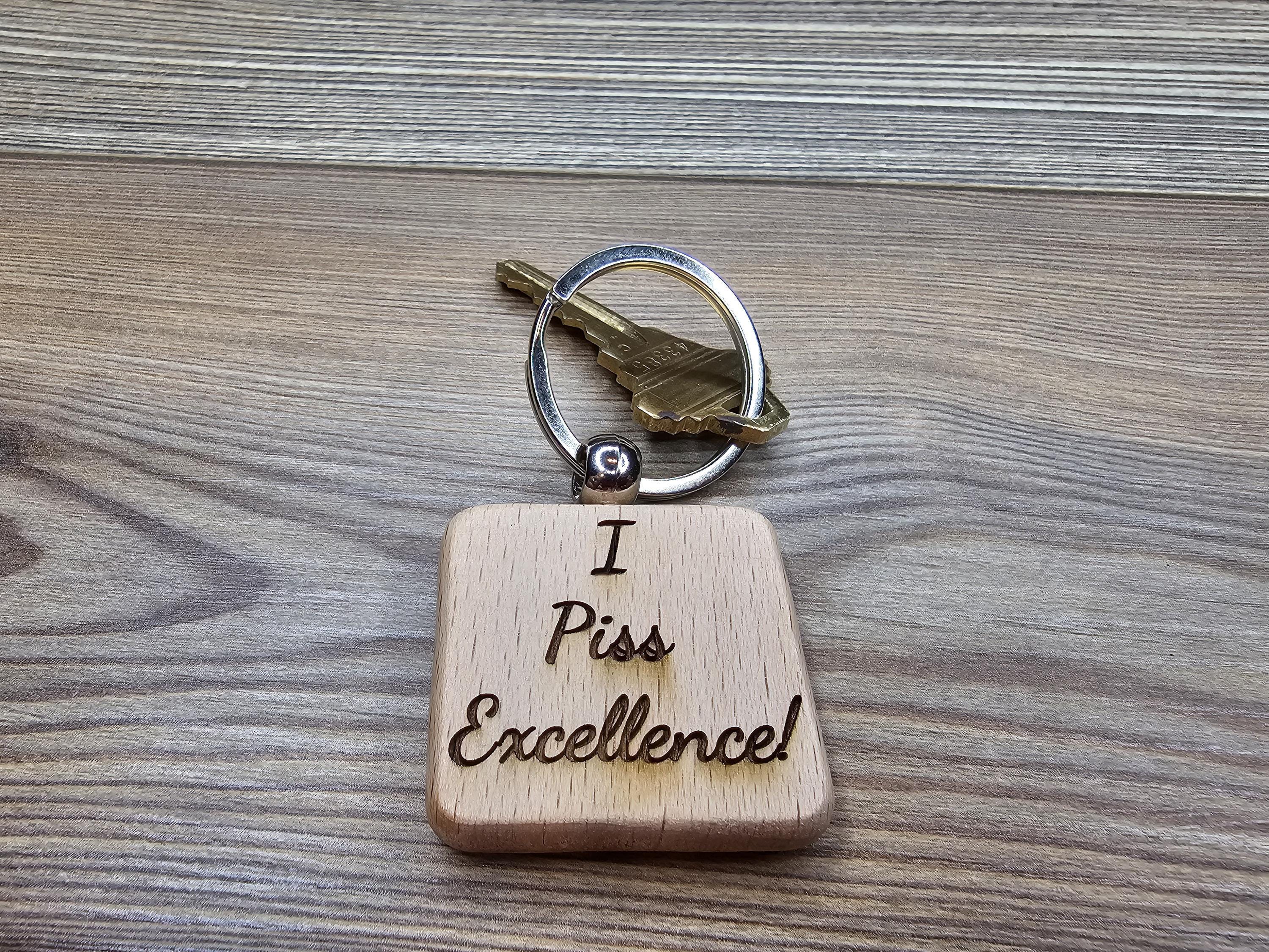 I piss excellence keychain: laser engraved hardwood, funny keychain gift