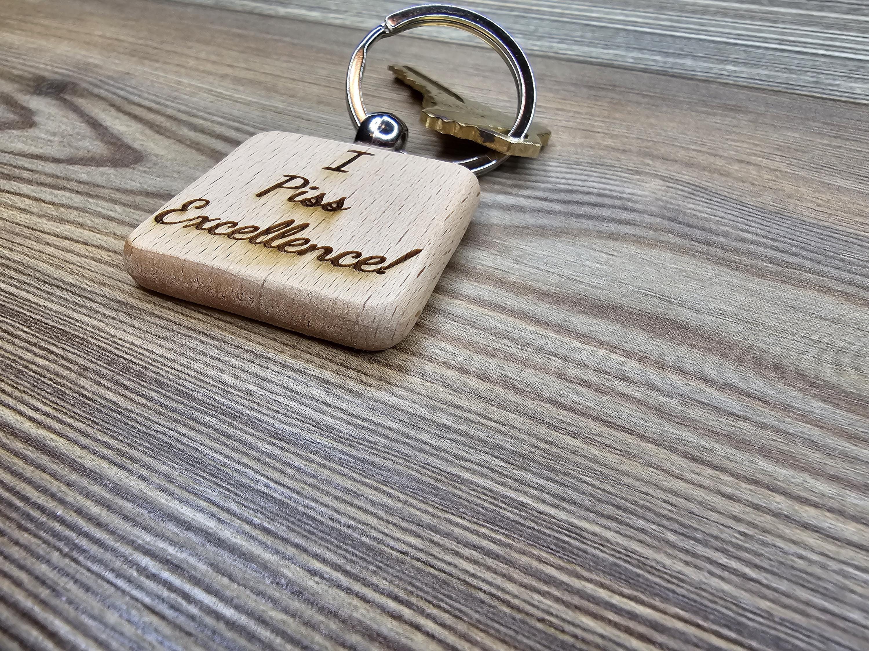 I piss excellence keychain: laser engraved hardwood, funny keychain gift