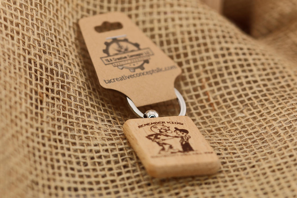 Electricity kills keychain / bag charm: laser engraved hardwood, stainless steel keyring