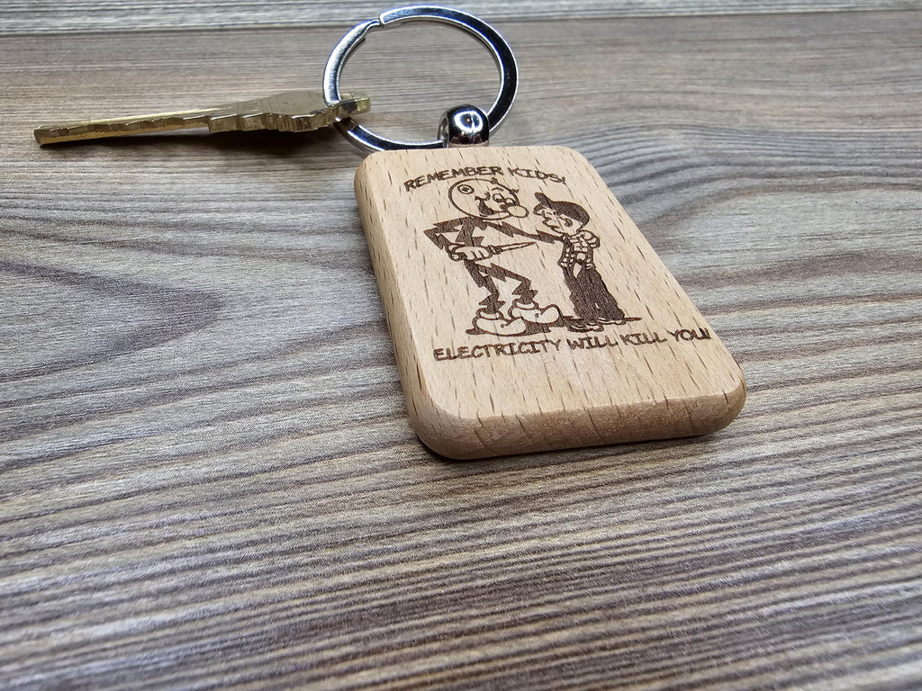 Electricity kills keychain / bag charm: laser engraved hardwood, stainless steel keyring