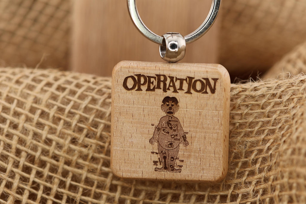 Operation board game keychain / bag charm: laser engraved wood, stainless steel keyring