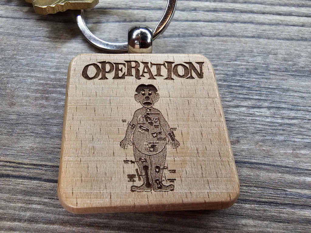 Operation board game keychain / bag charm: laser engraved wood, stainless steel keyring