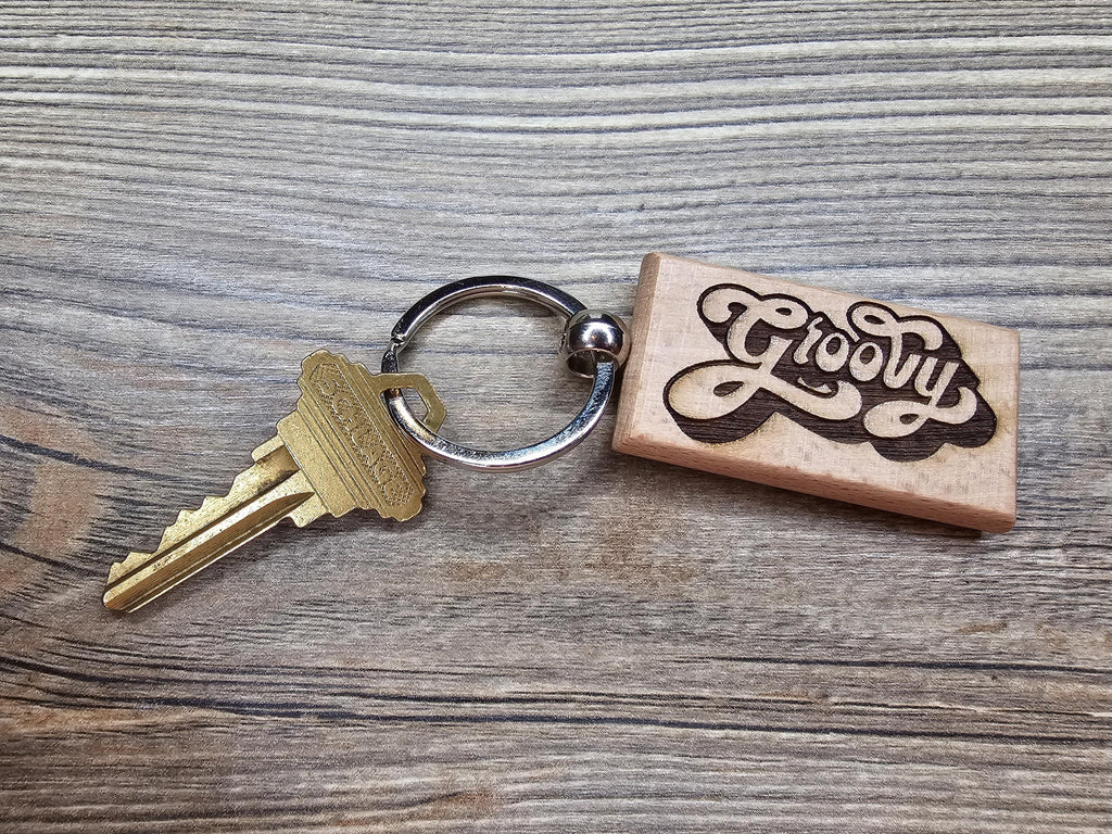 Groovy keychain / bag charm: double-sided laser engraved hardwood, retro 70s style