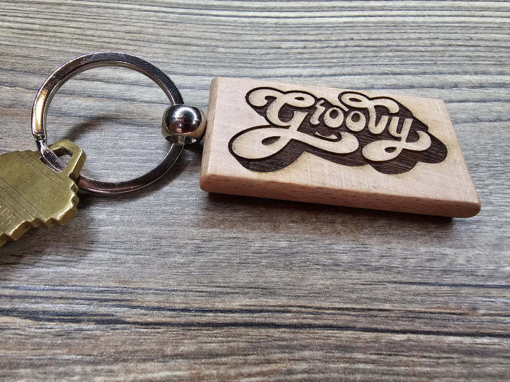 Groovy keychain / bag charm: double-sided laser engraved hardwood, retro 70s style