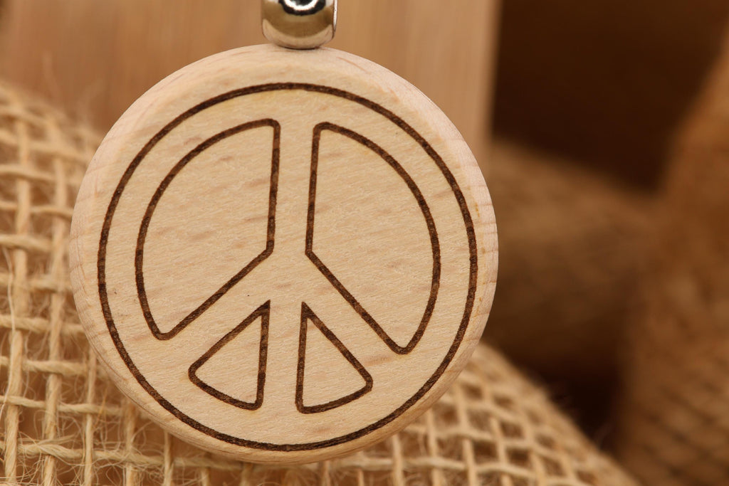 Laser engraved peace sign keychain / bag charm: hardwood with stainless steel keyring