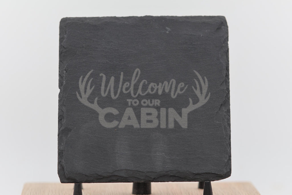 Laser engraved slate cabin coasters: rustic home bar decor
